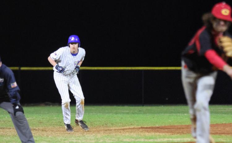 Eli Frost, a sophomore, leads off second base during his teammate's at-bat. (Photo/Emily Dozier)