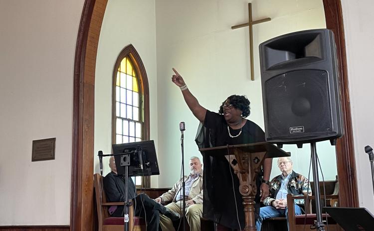 Delbra Kendrick sings as fellow performers look on at "An Old-Fashioned Fifth Sunday Gospel Sing" at the Beth-Salem Presbyterian Church on Sunday. The event was part of the Lexington Downtown Development Authority's 2023 Concert Series, which is raising funds for a community center in the Macon Coil building. (Photo/Gray Jones)