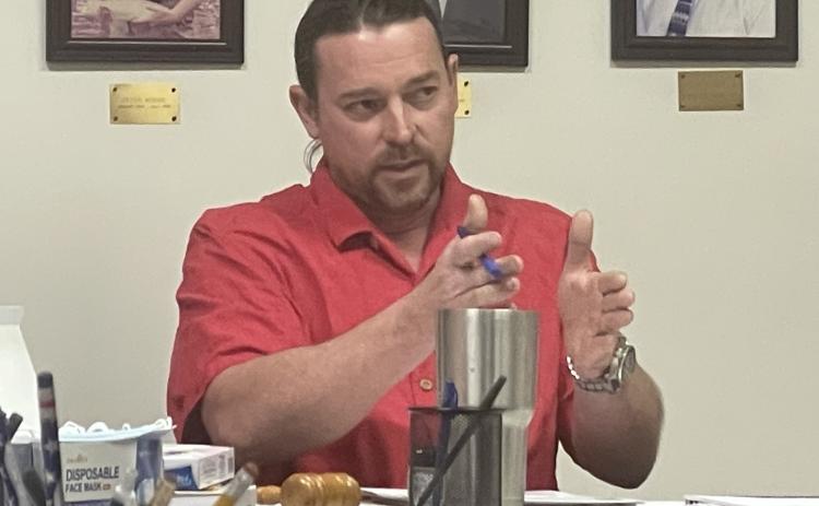 Crawford Mayor Seavy O’Neal goes over the agenda during the city council meeting earlier this month.  (DeAnthony Moore/Oglethorpe Echo)