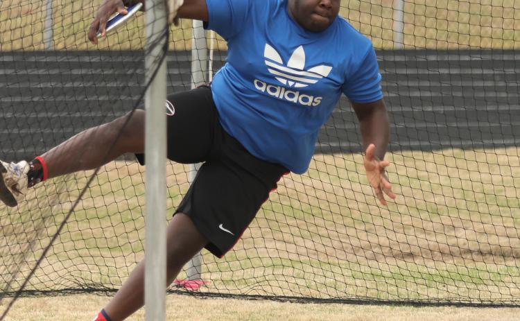 Senior ZaNyain Hawkins practices discus at OCHS track and field practice. The OCHS boys finished sixth in Class AA in 2021 and fourth last year. (Photo/Emily Dozier)