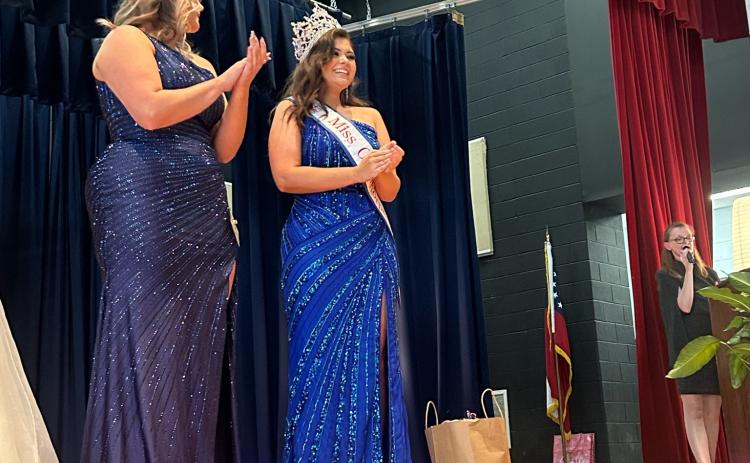 Macie McDaniel, a junior at Oglethorpe County High School, is all smiles after winning the title of Miss Oglethorpe County High School. (Shelby Wingate/The Oglethorpe Echo)