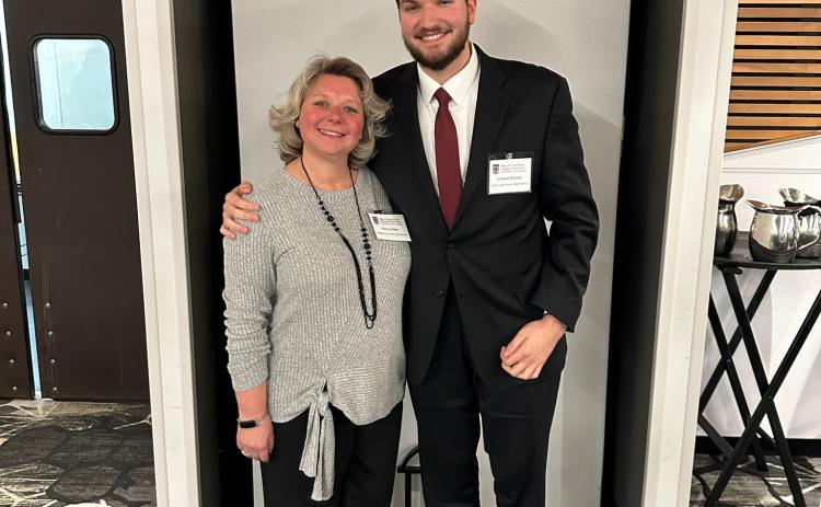STAR student Charlie Brewer and STAR teacher Penny Miller attended a banquet at the University of Georgia’s Continuing Education Center, where he spoke about his achievements, interests and Miller’s impact on him. (Submitted photo)
