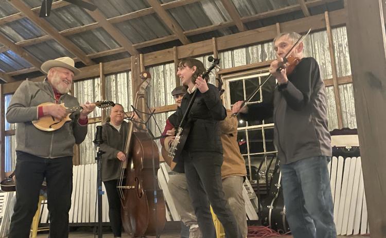 The Barrow Creek Bluegrass Band performed at the Platt-Brooks Estate Venue on Saturday, March 18th as a fundraising event for the Lexington GA Downtown Development Authority. The band played for hours, accepting requests from the audience and exploring genres. (Photo/Sophie McLeod)