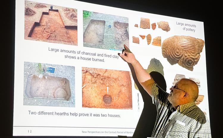 James Wettstaed shows pictures of a Stephens County excavation site he worked on during his presentation at the Historic Oglethorpe County meeting on March 28. Volunteer excavations that spanned from 2014 to 2018 unearthed two distinct hearths, proving that one house had been there in the early 1500s, and another in the late 1500s. (Photo/Maddie Daniel)