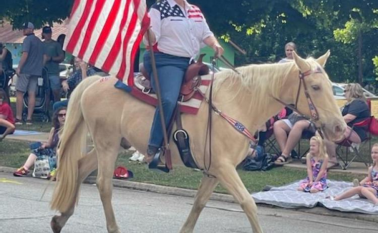 Ruth Wilson is pictured leading the 2022 Winterville Marigold Festival Parade. She is on her parade horse, "Major." (Photo/ Ruth Wilson)