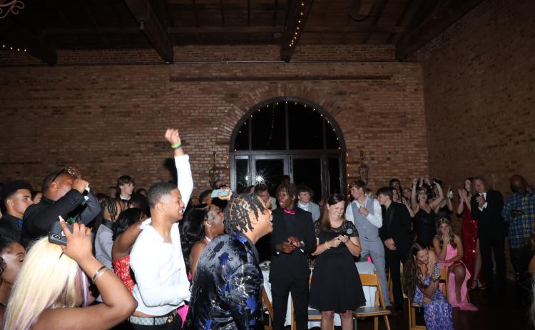 Students react to the announcement of Nadia Henderson as prom queen. (LANDEN TODD/THE OGLETHORPE ECHO)