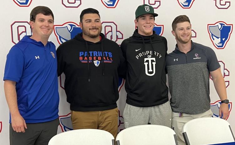 Blane McFarland (third from left) signed to play baseball at Thomas University in Thomasville last week. McFarland was Oglethorpe County’s team MVP this spring when he led the Patriots with 67 strikeouts in 51 innings pitched and sever- al offensive categories, including average (.355), home runs (five), RBIs (23) and tied for the team lead with 23 runs. He was first-team all-region DH, as voted by the region’s baseball coaches. Also pictured (from left), assistant coach Brice Bonner, head coach Kris Patel.