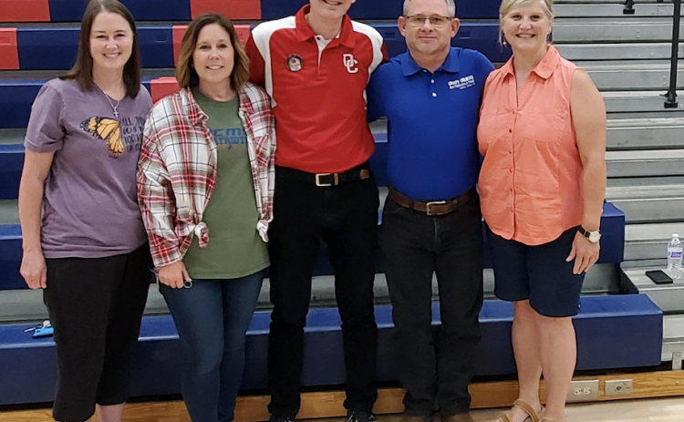 Eric Schmidt (center) stands with four students from his first year of teaching last week. All four (from left): Wanda Colquitt, Brenda McCormack, Schmidt, Tim Poole and Andrea Ash work with Oglethorpe County Schools. (SUBMITTED PHOTO)
