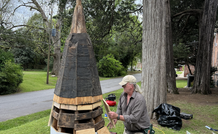 Carpenter Peter Mallet works on the old steeple at Lexington Baptist Church earlier this year. The steeple was installed in 1893 and replaced in 1975, but remains on church grounds. (SUBMITTED PHOTO)