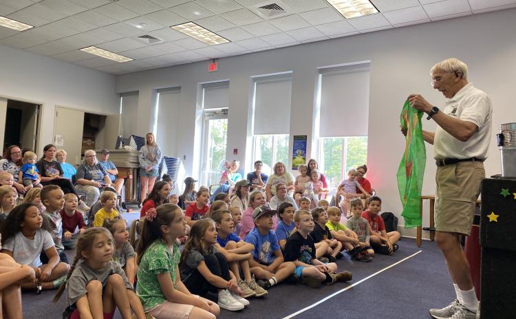Mr. Keith the Magic Man performed his Magical Acts of Kindness show at the Oglethorpe County Library on May 30, one of many events scheduled there this summer. (BABS DeARMOND/FOR THE OGLETHORPE ECHO)