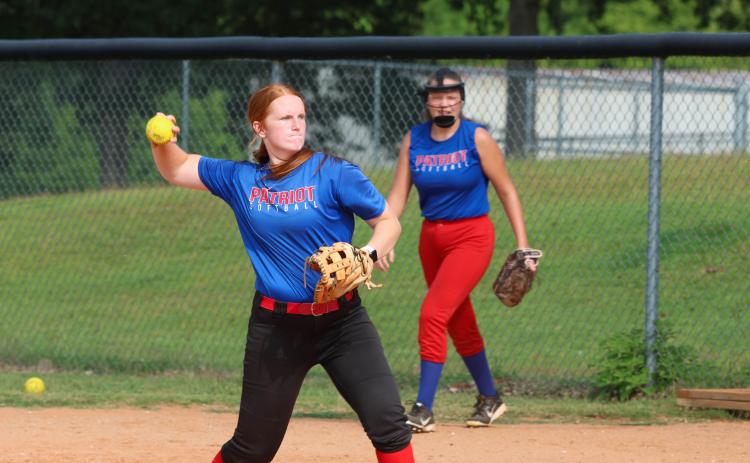 Abby Jones, the only senior on the Oglethorpe County softball team, throws the ball home during practice on Monday. Jones is only one of four upperclassmen on a team dominated by freshmen. (LANDEN TODD/THE OGLETHORPE ECHO)