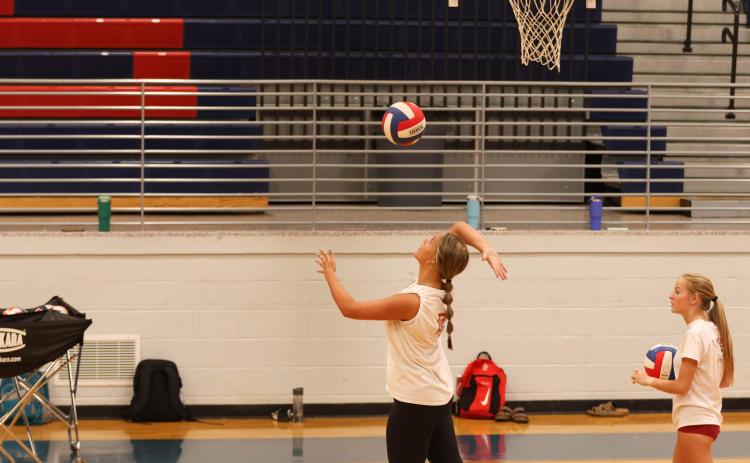 OCHS sophomore Elizabeth Cook serves during practice earlier this season. Cook had five kills in victories over Prince Avenue Christian School and George Walton on Tuesday. (LANDEN TODD/THE OGLETHORPE ECHO)
