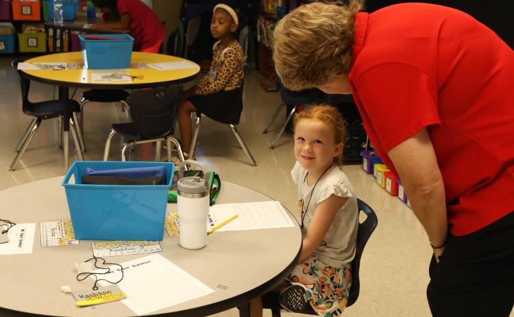 Superintendent Beverley Levine chats with a student at Oglethorpe County Primary School on the first day of the school year. (LANDEN TODD/THE OGLETHORPE ECHO)