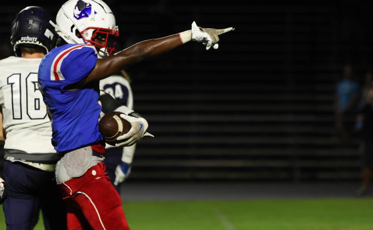 Darius Heard signals a first down during Oglethorpe County’s 19-7 victory over West Hall in a football scrimmage on Friday night. Heard will play both defensive back and receiver this season. (LANDEN TODD/THE OGLETHORPE ECHO)