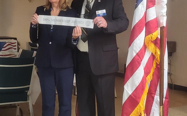 Carol Eidson, commander of Post 123, and Rick Baugh, 10th District commander, hold the membership award at the 104th annual convention. (SUBMITTED PHOTO)