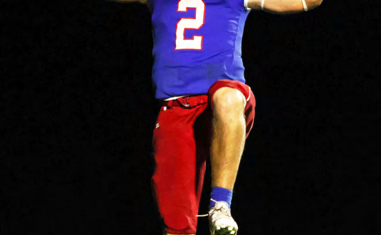 Running back Jake Turner does his best Karate Kid imitation after scoring a touchdown in Oglethorpe County’s 19-7 victory over West Hall in a scrimmage last week. The Patriots open the 2023 season at East Jackson at 7:30 p.m. Friday. (LANDEN TODD/THE OGLETHORPE ECHO)