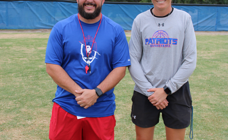 Co-athletic directors Michael Holland (left) and Brianna Dickens were promoted to the position in June, becoming the fifth co-ADs in the past eight years. Holland also is the head football coach and Dickens is the head coach of the girls basketball and softball team. (LAUREN HILL/THE OGLETHORPE ECHO)