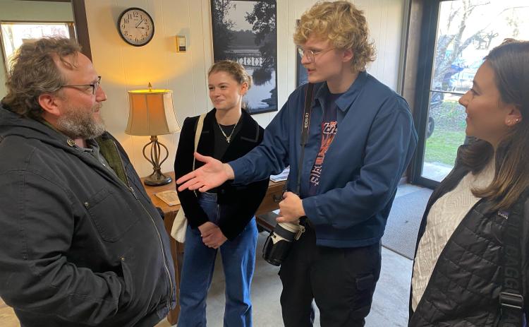 Paul Thiel, director of operations for the Oglethorpe County School District, talks with Margaux Binder, business and infrastructure, and Jim Bass and Ellie Pool, education and schools reporters. (Photo/Dink NeSmith)