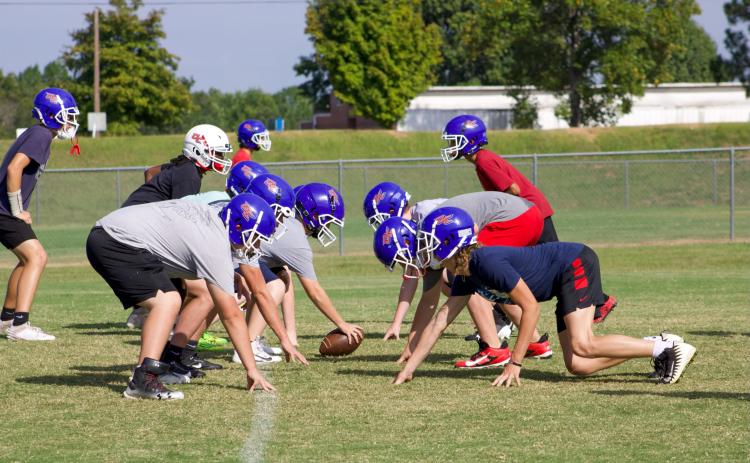 Players on the OCMS football team line up against each other at practice on Thursday, Sept. 5. The team has a record of 5-0 this season. (Audrey Pfitzner/The Oglethorpe Echo)