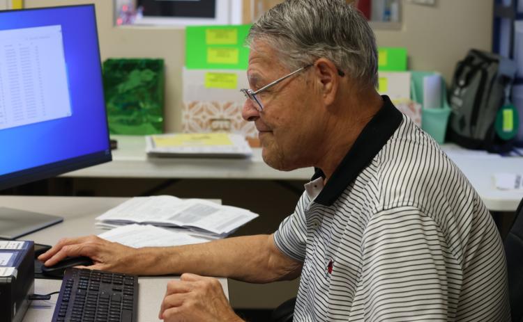 Oglethorpe County Board of Elections assistant Steve McCannon urges voters to mail their absentee ballots as soon as possible. Georgia was last in the nation in July for on-time delivery with only 63.7% of first-class mail delivered on time. (Photo/ Sarah Coyne)