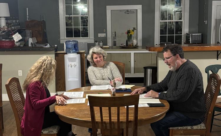 Leslie Whitehead O'Neal, Penny Miller, and Ed Smith rehearse "Love Letters." The play will run from Feb. 20-22 at the Historic Crawford School.  (Jet Rawls/The Oglethorpe Echo)
