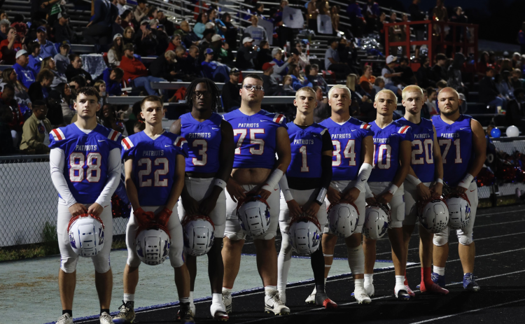 Oglethorpe County’s seniors include Braxton Edmondson (from left), Clint Graham, O’Maury Huggs, Brock Barrett, Caden Hartrum, Tanner Mckie, Dalton Hilley, Keagan Moats and Stephen Berlin. Several dyed their hair blond before last week’s game. (Jackson Bramlett/The Oglethorpe Echo)
