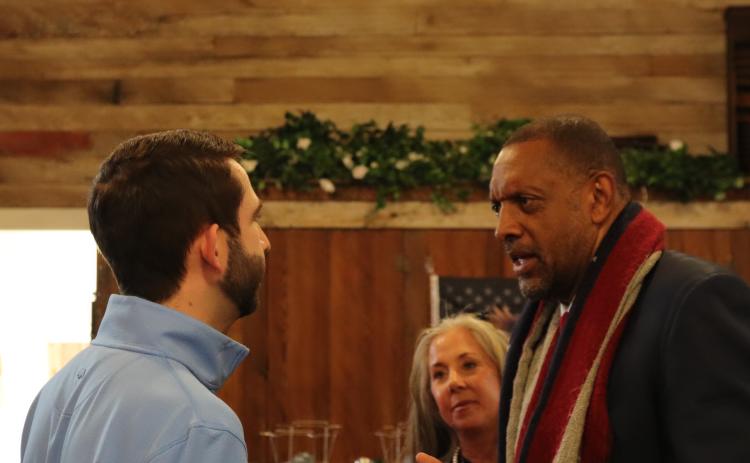 Houston Gaines (left), a candidate for the U.S. House of Representatives, chats with Vernon Jones, former state representative and candidate for Georgia Secretary of State, on Saturday. They took part in the GOP rally held at the Historic Crawford Depot. (Photo/Riley Baugh)