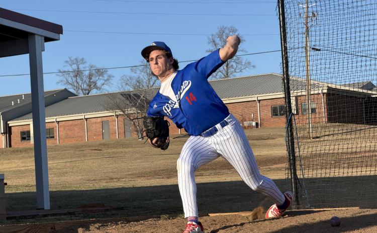 Jackson Tatum warms up in the bullpen before starting against Georgia School for Innovation and the Classics (GSIC) at TY Harris Field on Feb. 12. The Patriots won 10-0 behind Tatum, who struck out six in five innings. (Photo/Nicholas Eriksen)