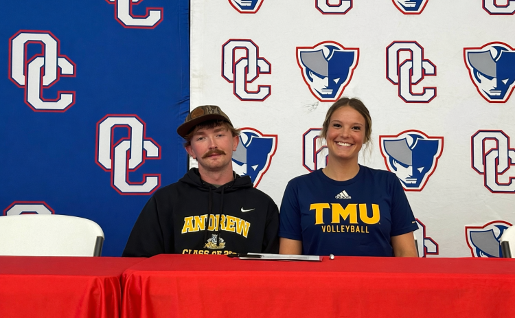 Cousins and OCHS athletes Tripp White and Elizabeth Cook show their college colors during White’s signing day on April 9. White, a pitcher, will play for Andrew College and Cook, a volleyball player, has signed to play at Truett McConnell. (Submitted Photo)