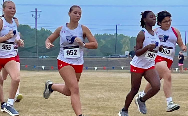 Members of the Oglethorpe County girls cross country team take part in the inaugural Patriot Stars and Stripes Invitational on Saturday at its new course. More than 300 runners took part in the event. (Submitted Photo)